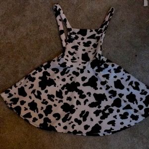 Overall dress cow print with pockets.